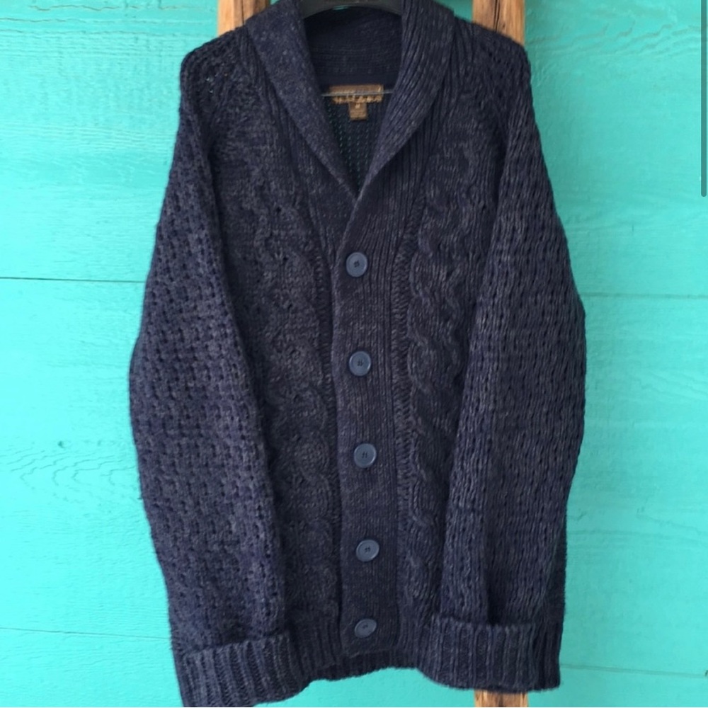 Chunky cardigan in navy blue with cables. Medium but can fit large